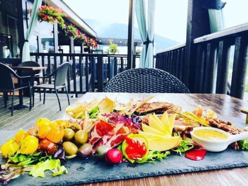 Smorgasboard of food on the deck at Sage, Nelson BC