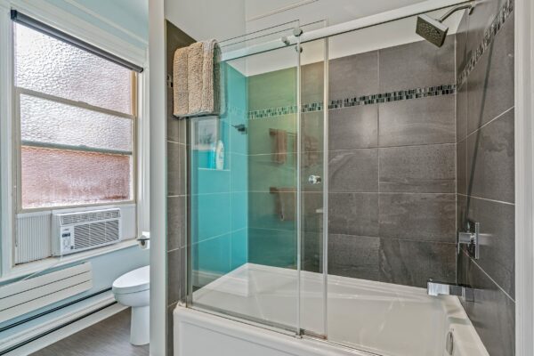 Sycamore bathroom showing large bath and shower